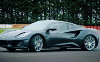 A V6 First Edition Lotus Emira being driven sideways on a racetrack