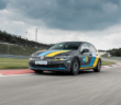 A Bilstein-branded Volkswagen cornering on a racetrack