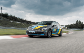 A Bilstein-branded Volkswagen cornering on a racetrack